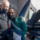 Amir Locke’s brother, Andre Locke Jr., is comforted by the Rev. Al Sharpton after his casket is placed into the hearse following Amir Locke’s funeral at Shiloh Temple International Ministries, Thursday, Feb. 17, 2022, in Minneapolis, Minn. Locke was killed Feb. 2 by Minneapolis police as they executed a no-knock search warrant.